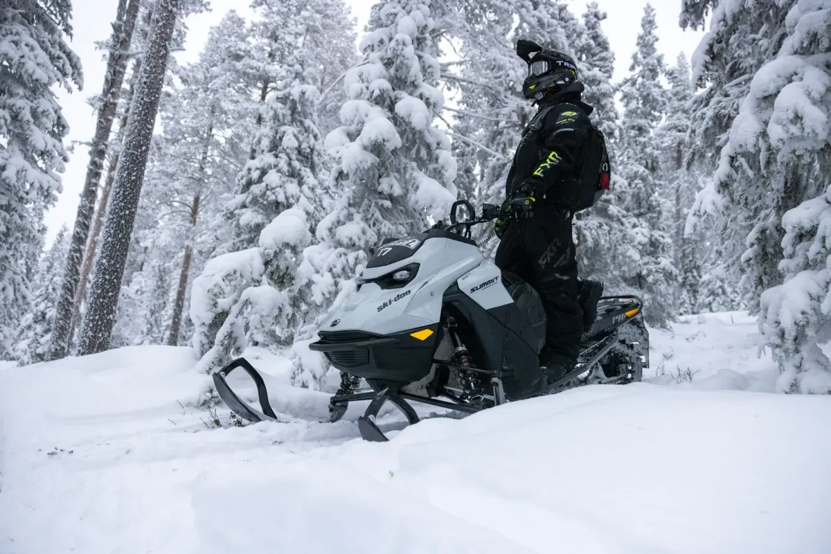 Snowmobile expedition across a frozen Arctic lake